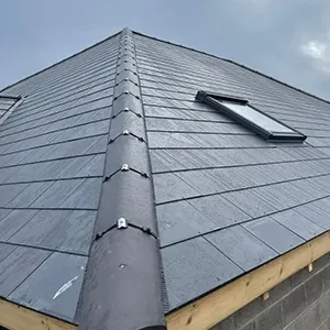 a black roof with a skylight on top of it