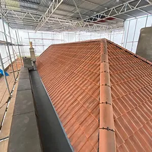 a large metal roof in a building