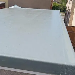 a mattress sitting on top of a metal bed frame